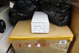 Two boxes of Zebra power adaptors and cables for Zebra label printers.