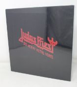 An as new Judas Priest 50 Heavy Metal Years collectors book.