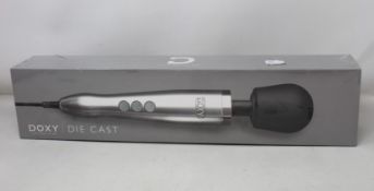 A boxed as new Doxy - Die Cast - Solid Metal Plug-In Vibrating Wand Massager (Over 18s only).