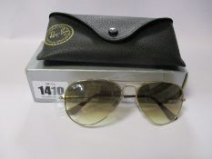 A pair of as new Ray Ban Aviator sunglasses.