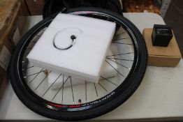An as new Lvbu electric bike conversion wheel with bluetooth controller.