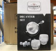 Five boxed as new Harrison's Finest globe decanter sets.