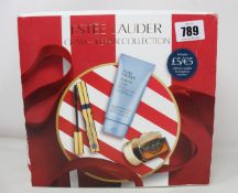 Three Estee Lauder Glam + Repair Collection Gift Sets.