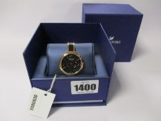 An as new Swarovski Crystalline Delight watch.