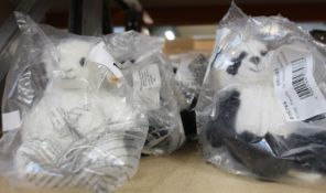 Four Steiff Ming Panda and a Steiff Fuzzy Lamb (18cm soft toys).