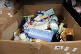 A box of as new assorted beauty products to include hair treatments, moisturisers, toners and