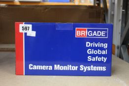 A boxed Brigade VBV-750-000 camera monitor system.