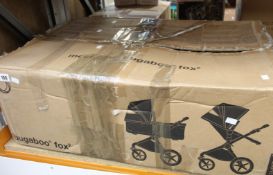 A Bugaboo Fox 2 pushchair (Box damaged) (Item may be incomplete, viewing recommended).