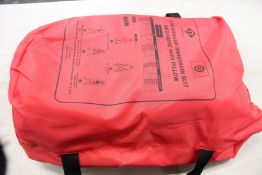 An as new Crewsaver immersion and thermal protective suit (XL).