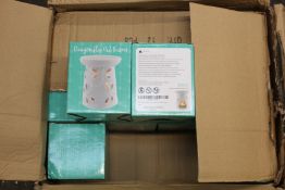 A large quantity of Jones Home and Gift Dragonfly oil burners (Approximately 40 items).