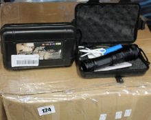 A box of Helius Zeta XO flashlight (Approximately 35 items).