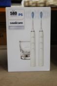 A boxed as new Philips Sonicare 9000 diamond clean electric toothbrush.