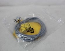 Four as new Turck inductive proximity sensors (Ni4-DS20-2AP6X2, 165022).