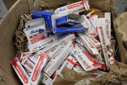 A large quantity of Markal ball point paints and industrial-use markers.