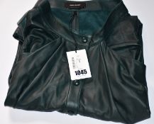 An as new Isabel Marant lamb leather knee skirt in dark green (FR 34 - €1850).