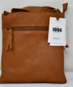 An as new Treats Kamma Common leather bag in cognac.