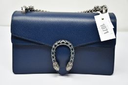 An as new Gucci Dionysus handbag in navy with dust bag (RRP £2,080).