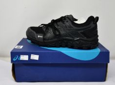 A pair of women's as new Asics Gel-FujiTrabuco 7 G-TX trainers (UK 8.5).