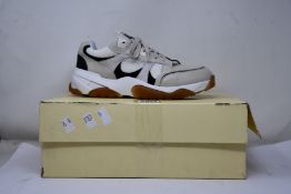 A pair of as new Axel Arigato Catfish Lo sneakers (UK 7).