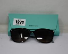 A pair of as new Tiffany & Co sunglasses.