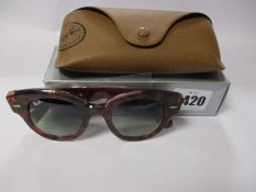 A pair of as new Ray Ban Roundabout sunglasses.