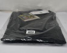 An as new Marmot Minimalist jacket (L).