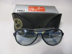 A pair of as new Ray Ban Vagabond sunglasses.