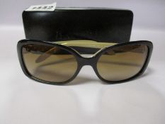 A pair of as new Ralph Lauren sunglasses.