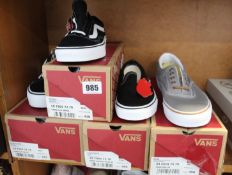 Four pairs of as new Vans footwear.