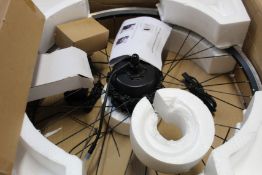 A boxed as new Unbranded electric bike conversion wheel (27.5
