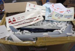 A quantity of model aircraft parts and related items.