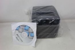 Two boxed label printers (Requires UK plug adaptor).