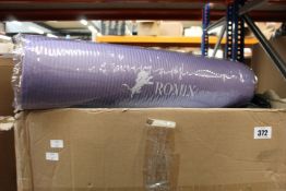 Eight as new purple yoga mats with carrying case.