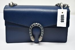 An as new Gucci Dionysus handbag in navy with dust bag (RRP £2,080).