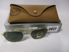 A pair of as new Ray Ban Frank sunglasses.
