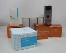 Twelve items of Mizon beauty products to include all in one snail repair cream, first essence, snail