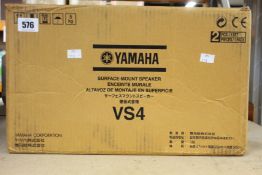 A pair of Yamaha VS4 surface mount speakers.