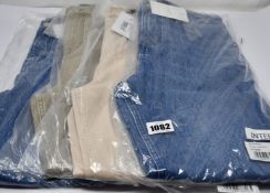 Four pairs of assorted Ted Baker jeans (All 28
