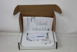 A boxed as new Welch Allyn Braun ThermoScan PRO 6000 ear thermometer with cradle.