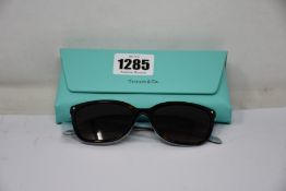 A pair of as new Tiffany & Co sunglasses.