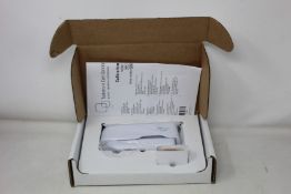 A boxed as new Welch Allyn Braun ThermoScan PRO 6000 ear thermometer with cradle.
