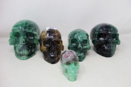 Five marble/Fluorite crystal skulls (Various sizes).