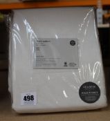 Two packs of as new West Elm linen cotton pole pocket blackout curtains (48 x 84 in).