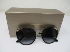 A pair of as new Bvlgari sunglasses.
