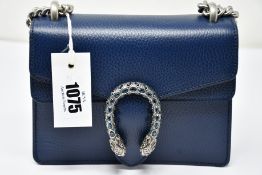 An as new Gucci Dionysus small handbag in navy with dust bag (RRP £1,600).
