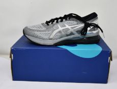 A pair of as new Asics Gel-Nimbus 21 Platinum trainers (UK 8).