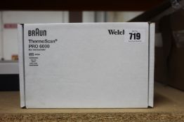A boxed as new Welch Allyn Braun ThermoScan PRO 6000 ear thermometer with cradle.