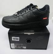 A pair of as new Nike Air Force 1 Low Supreme (UK 7.5).