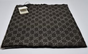 An as new Gucci SL GGWEB 140x140 scarf/shawl.
