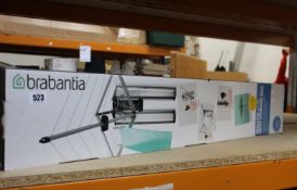 A Brabantia WallFix Retractable Washing Line with storage box (24m).